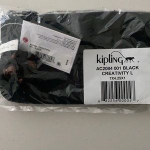 Kipling carry-all accessory